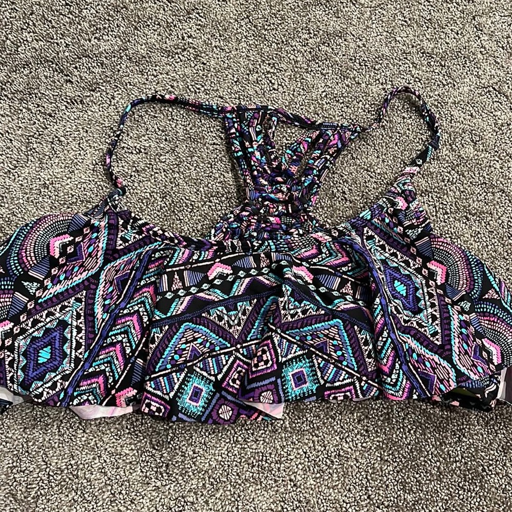 A Large colorful swimsuit top